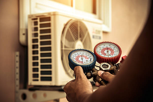 Professional Heat Pump Repair technician working in Gateway, FL